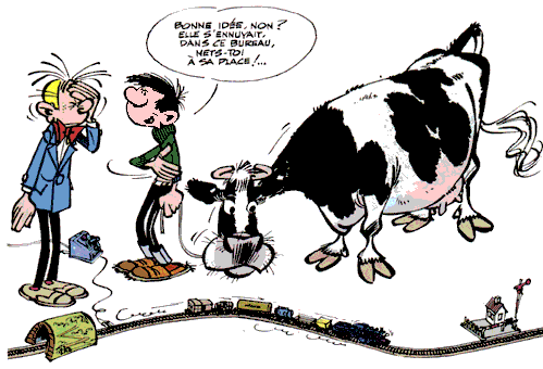 Gaston Lagaffe avec une vache regardant passer un train électrique